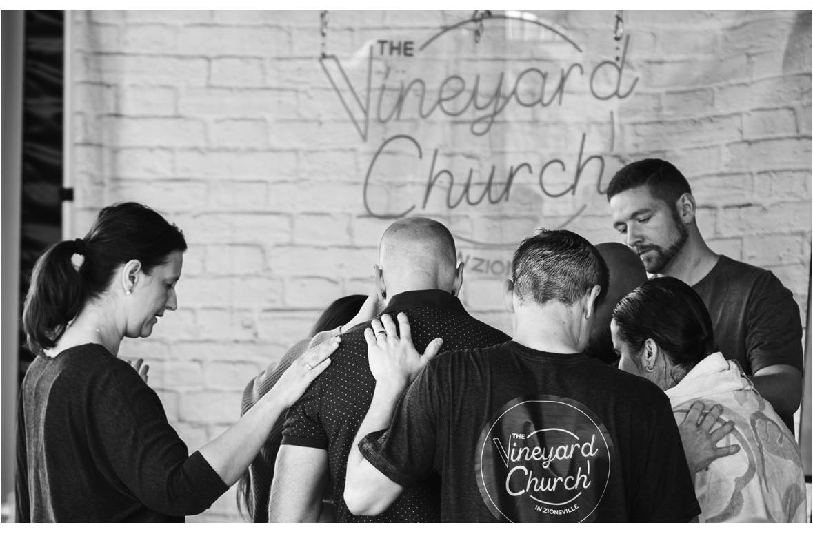Prayer circle at ViZi Church